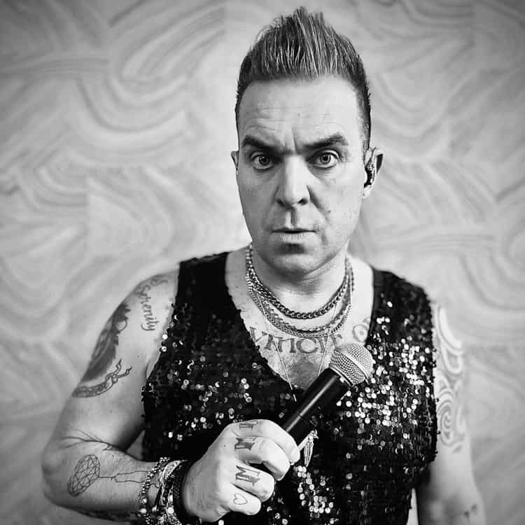 Tony as Robbie Williams